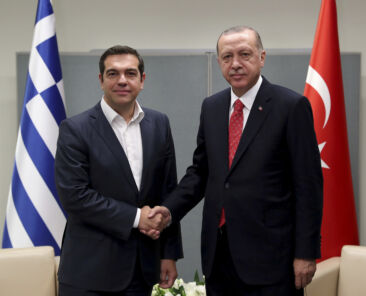 Turkey's President Recep Tayyip Erdogan, right, shakes hands with Greece's Prime Minister Alexis Tsipras, left, prior to their talks in New York, Tuesday, Sept. 25, 2018. The two leaders are in New York for the 73rd session of the United Nations General Assembly. (Presidential Press Service via AP, Pool)