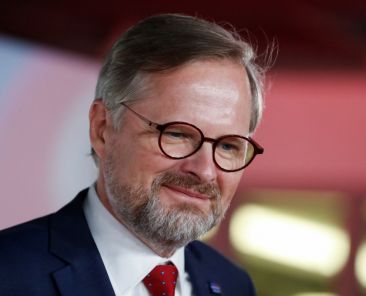 FILE PHOTO: Leader of Civic Democratic Party (ODS) and Together (SPOLU) coalition candidate for prime minister Petr Fiala arrives at a televised debate, ahead of the country's parliamentary election in Prague, Czech Republic October 7, 2021. REUTERS/Bernadett Szabo