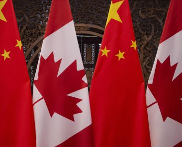 BEIJING, CHINA - DECEMBER 5: Canadian and Chinese flags are seen prior to the meeting between Canadian Prime Minister Justin Trudeau and Chinese President Xi Jinping at the Diaoyutai State Guesthouse on December 5, 2017, in Beijing, China. A group of former diplomats and academics have signed an open letter to Chinese President Xi Jinping calling for the release of two Canadians who have been detained on allegations of espionage. (Photo by Fred Dufour-Pool/Getty Images)