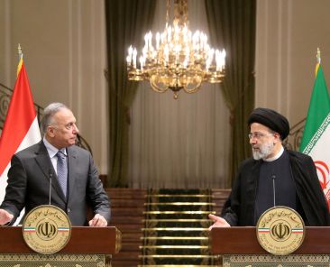 Iranian President Ebrahim Raisi and Iraqi Prime Minister Mustafa al-Kadhimi attend a news conference in Tehran, Iran, June 26, 2022. President Website/WANA (West Asia News Agency)/Handout via REUTERS ATTENTION EDITORS - THIS IMAGE HAS BEEN SUPPLIED BY A THIRD PARTY.