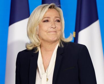 2J5MT25 Paris, France. 24th Apr, 2022. Marine Le Pen, candidate of the far-right National Rally party, attends a rally after the presidential runoff in Paris, France, on April 24, 2022. French incumbent President Emmanuel Macron won the 2022 French presidential runoff with 58 percent of the votes, according to the preliminary exit poll released Sunday evening by French television BFMTV. Macron's rival, far-right wing candidate Marine Le Pen, gained 42 percent of the votes. Credit: Xinhua/Alamy Live News