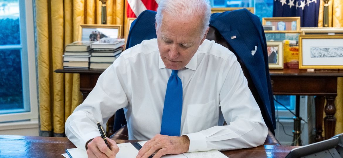 U.S. President Joe Biden signs an executive order, in Washington