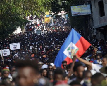 Protesters march during a demonstration called by artists to demand the resignation of Haitian president Jovenel Moise, in the streets of Petion Ville, Port-au-Prince, Haiti October 13, 2019. REUTERS/Andres Martinez Casares - RC1C28637CD0