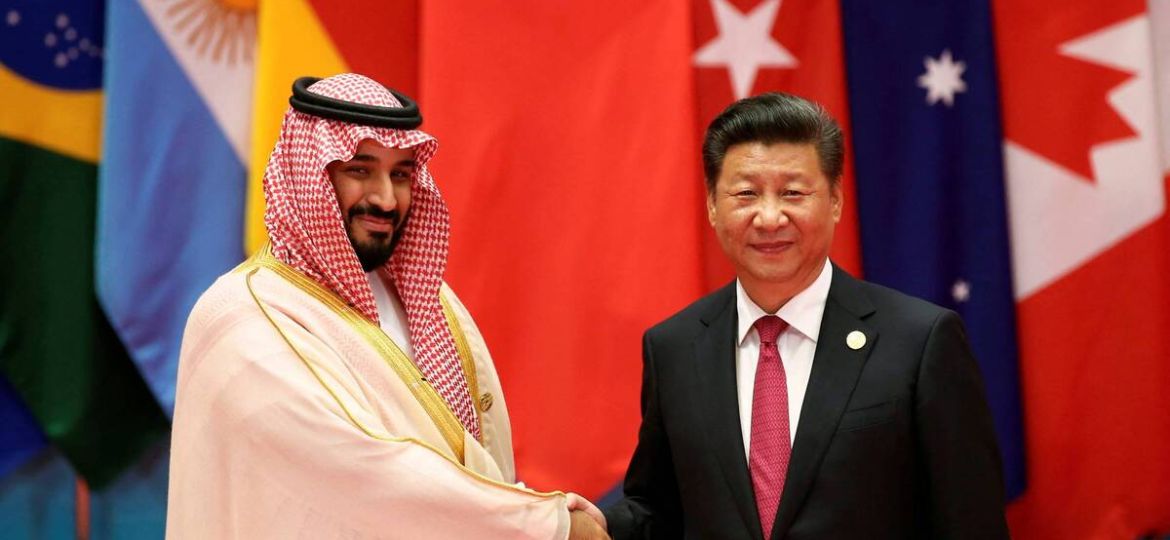 FILE PHOTO: Chinese President Xi Jinping shakes hands with Saudi Arabia's Deputy Crown Prince Mohammed bin Salman during the G20 Summit in Hangzhou