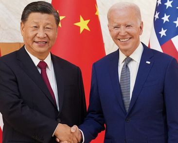 U.S. President Joe Biden shakes hands with Chinese President Xi Jinping as they meet on the sidelines of the G20 leaders' summit in Bali, Indonesia, November 14, 2022. REUTERS/Kevin Lamarque