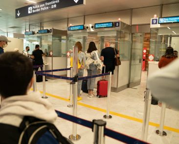 Travelers-Undergoing-Border-Control-In-An-Airport-In-France-Europe