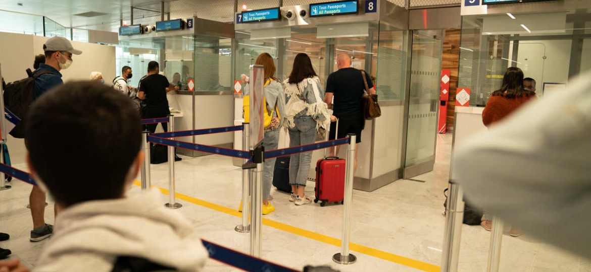 Travelers-Undergoing-Border-Control-In-An-Airport-In-France-Europe