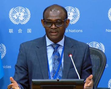 Sudans-Ambassador-to-the-UN-Alharith-Idris-speaks-to-reporters-on-May-12-2023