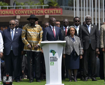 The president of Kenya, William Ruto (centre), surrounded by other African leaders, delivers his closing speech at the summit. Photograph Simon MainaAFPGetty Images